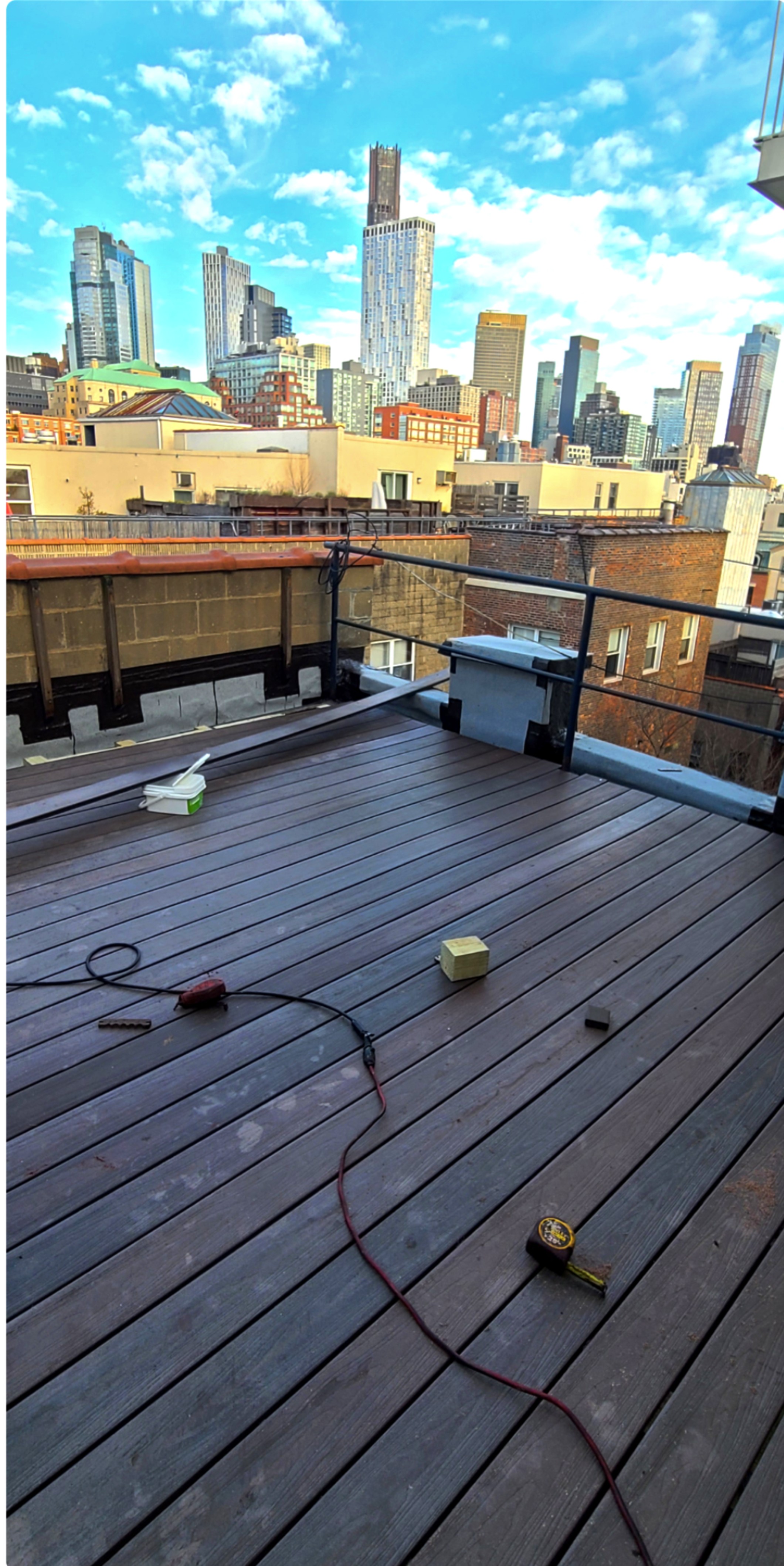 Rooftop deck installation with Manhattan skyline view